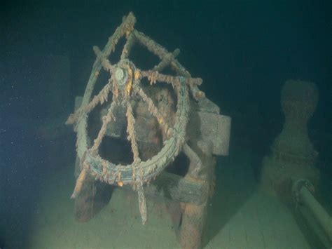 The ship's wheel, at the Nelson's stern, shows damage caused by the sinking in 1899. Abandoned ...