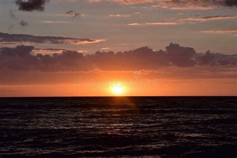 Golden sunset on beach stock photo. Image of ocean, golden - 99168016