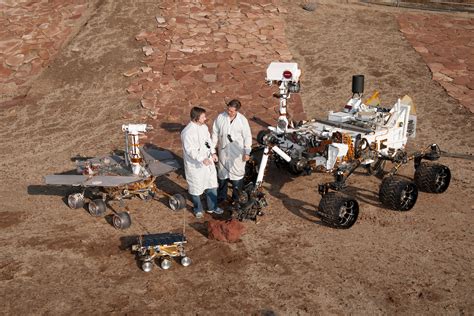 Three Generations of Rovers with Standing Engineers – NASA Mars Exploration