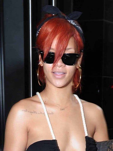 Rihanna's Chest "Always a Lesson, Never a Failure" Tattoo- PopStarTats