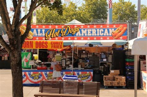 an outdoor food stand that sells hot dogs and corn dogs for the first time in years