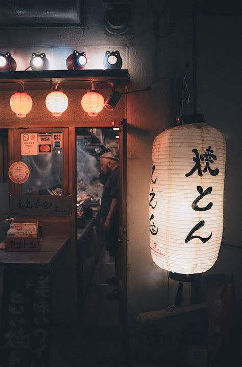 Traditional Lantern near Restaurant on Night Street · Free Stock Photo