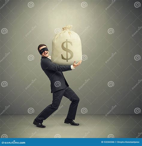 Man Holding Big Bag with Money Stock Photo - Image of grey, concept: 53244346