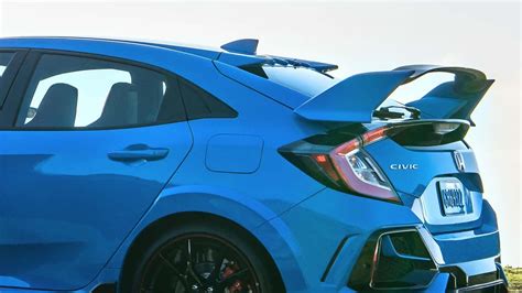 Wings On The Back Of Cars - Performance or Posing? | Torque News