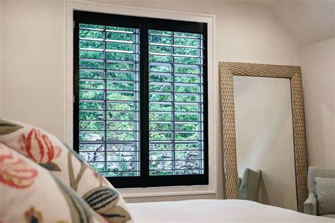 Modern Black Shutters Vs. Traditional White Shutters - Louver Shop Shutters