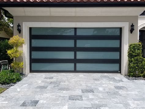 Impact Glass Garage Doors for Sale in South Florida | Broten