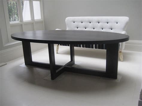 Black Oak oval dining table. - Alex Brooks Furniture