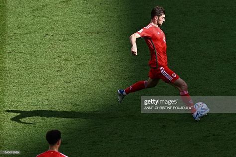 Wales' defender Ben Davies runs with the ball during the Qatar 2022 ...