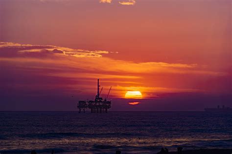 Oil Rig Sunset Watchers. | Smithsonian Photo Contest | Smithsonian Magazine