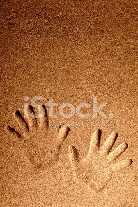 Handprints In The Sand Stock Photo | Royalty-Free | FreeImages