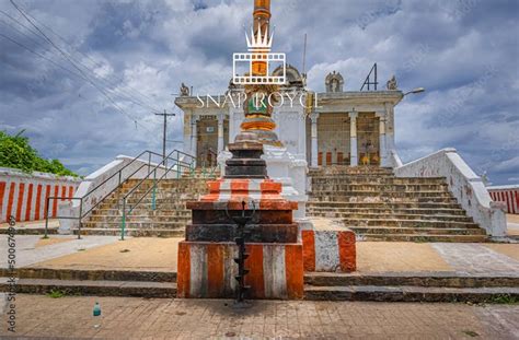 an old fountain in front of some stairs