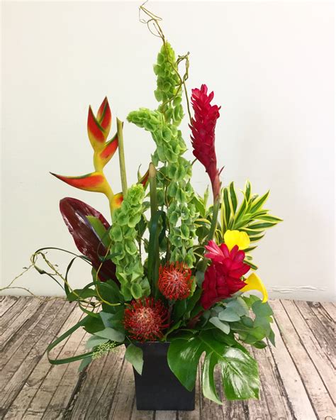 Tropical arrangement | Flower delivery, Order flowers online, Flowers online