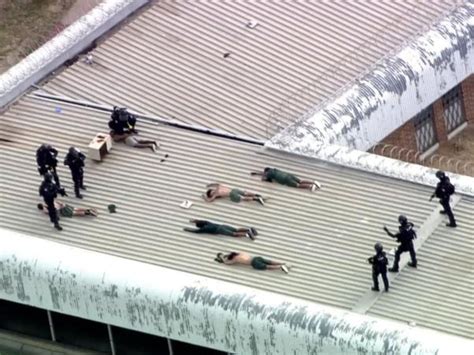 Hakea Prison: At least six inmates scale roof of Perth jail in reported protest | Daily Telegraph