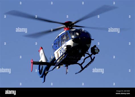 A police helicopter with a thermal camera Stock Photo - Alamy