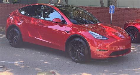 Tesla Model Y joins stunning red Roadster at annual shareholder meeting