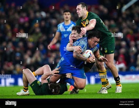 Samoa's Josh Papali'i (centre) tackled by Australia's Cameron Murray and Isaah Yeo during the ...