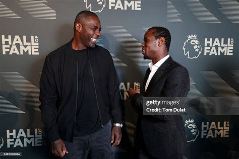 Actor, Idris Elba reacts with Michael Ward during a Premier League... News Photo - Getty Images