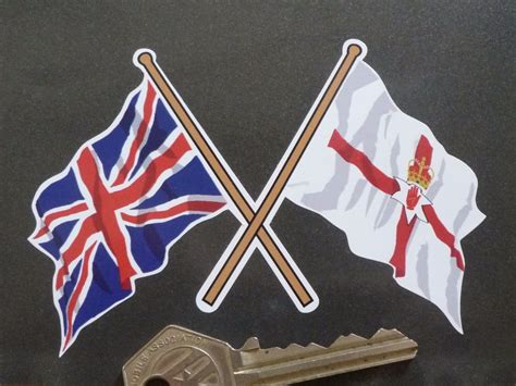 Crossed Union Jack & Northern Ireland Flag Sticker. 4".