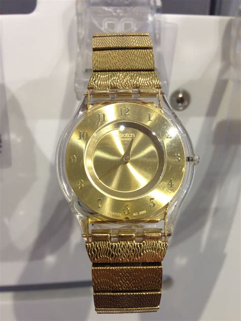 Gold Swatch watch | Swatch watch, Gold watch, Watches