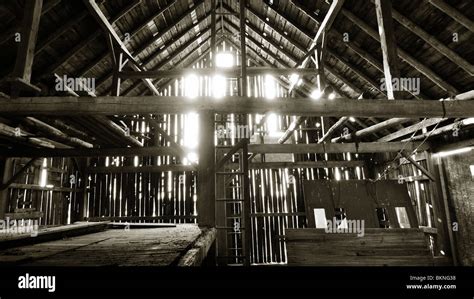 Interior of old unused and abandoned rural barn structure Stock Photo ...