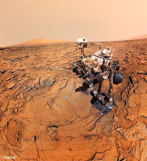 A self-portrait of NASA's Mars rover shows the vehicle at a drilled ...