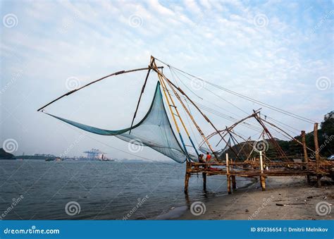 Chinese Fishing Nets and Small Ship at Dramatic Sunset Sky Background Stock Photo - Image of ...