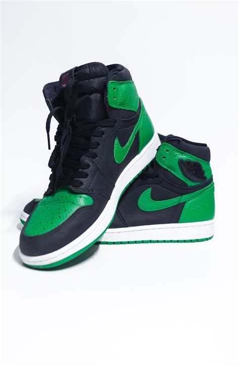 Black and Green Nike High Top Sneakers · Free Stock Photo