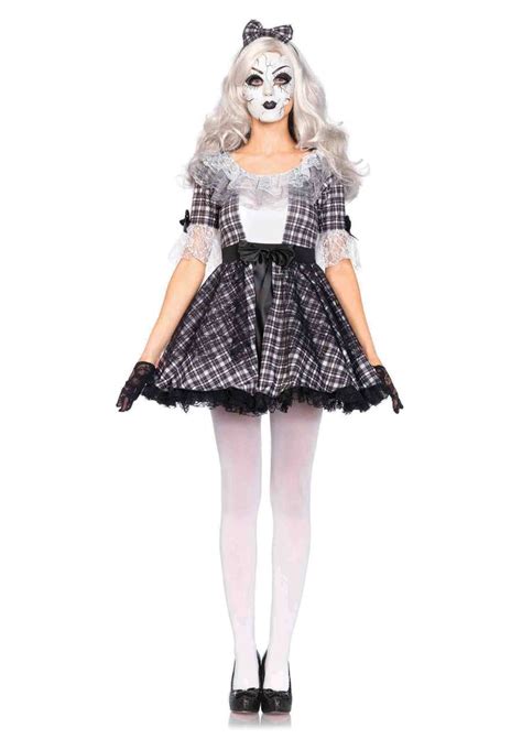 includes lace trimmed dress with bow accents, matching bow headband, and creepy doll face ...