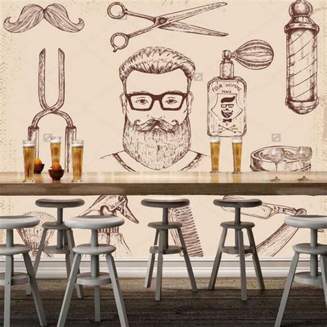 a bar with several stools and various items on the wall behind it, including a man's face