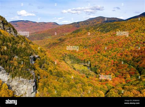 Panoramic view of peak fall foliage in Smugglers Notch, Vermont Stock ...