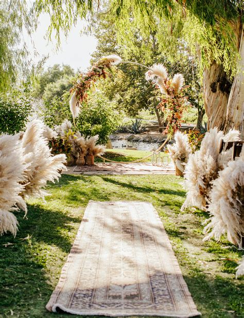 An Edgy + Boho Wedding Full of Lush Pampas Grass Decor and Chic Black Bridesmaids Dresses ...