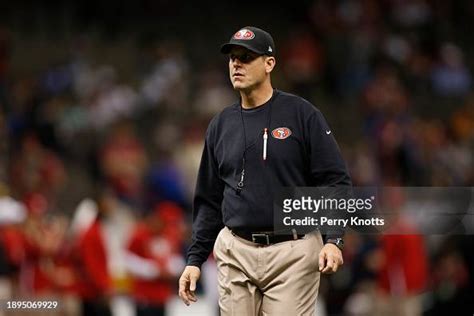 San Francisco 49ers head coach Jim Harbaugh on the field during warm ...