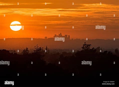 Sunset over Los Angeles city skyline Stock Photo - Alamy