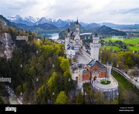 Aerial view of Neuschwanstein Castle with Lake Alpsee and Bavarian Alps, Schwangau, Ostallgäu ...