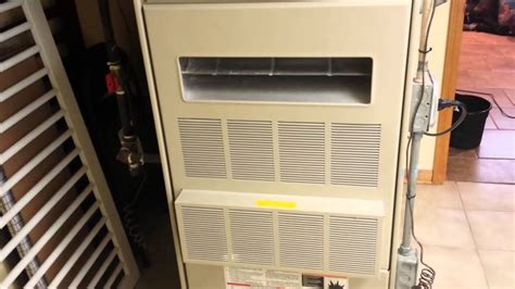 How do I change the filter in my Lennox furnace?