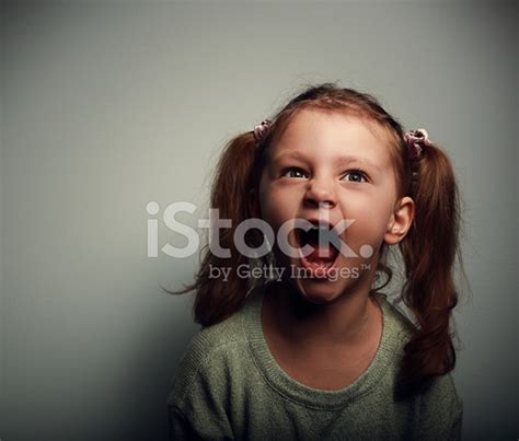 Shouting Angry Kid Girl With Open Mouth And Negative Look Stock Photo | Royalty-Free | FreeImages