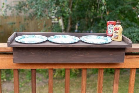 This deck railing table is the perfect size for three plates and a few ...