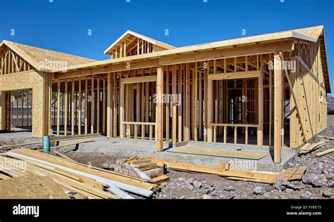 New housing carpentry wood frame construction industries Stock Photo - Alamy