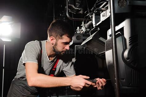 The Lighting Engineer Adjusts the Lights on the Stage. Stock Image - Image of apparatus ...