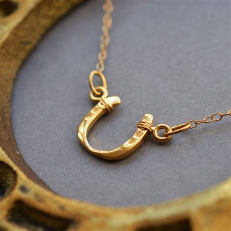 gold plated horseshoe necklace by lily charmed | notonthehighstreet.com