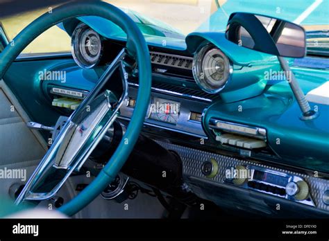 Interior closeup showing details of dashboard of a 1961 Plymouth Stock ...