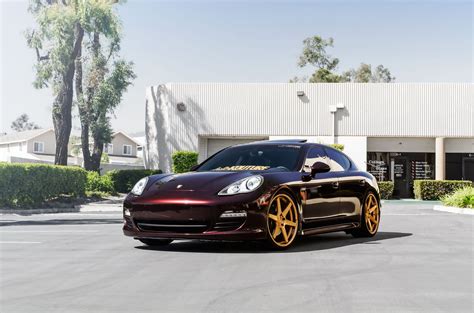 Imposing Dark Red Porsche Panamera Sits on Gold Concept One Wheels — CARiD.com Gallery