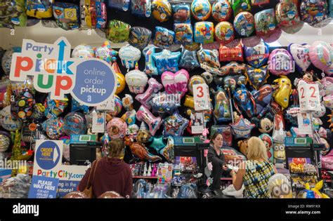 Party city store balloons hi-res stock photography and images - Alamy