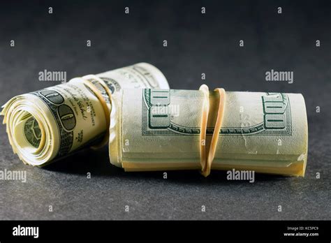 Money rolls hi-res stock photography and images - Alamy