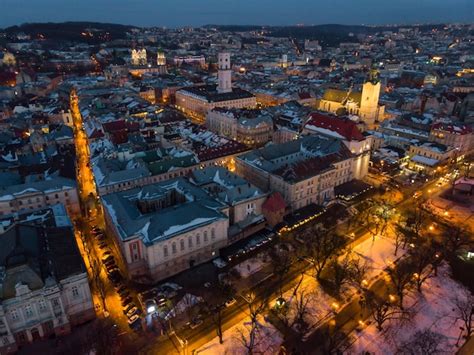 Premium Photo | Aerial view of city in night time streets in car lights