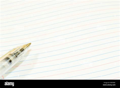 Pen on white paper Stock Photo - Alamy