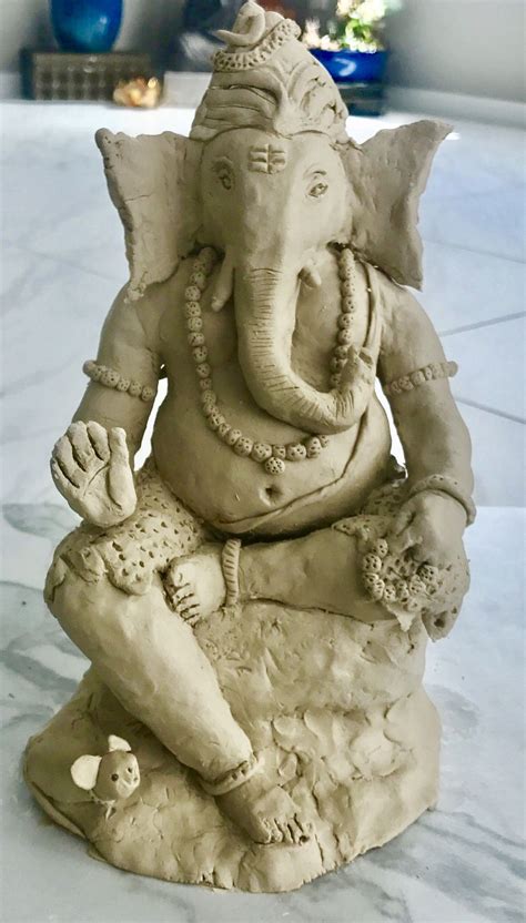 How to make ganesha with clay clay ganesh making at home clay se ganesh ...