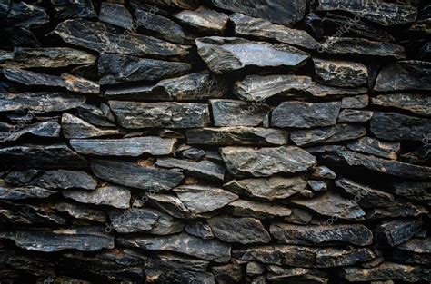 Rock wall texture background decoration in the garden — Stock Photo © sumintra #80508794