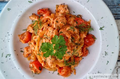 Creamy Tomato Salmon Pasta - lovethatbite.com