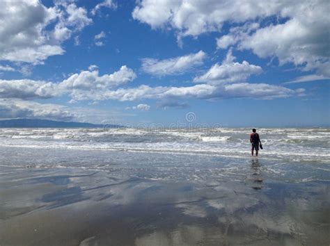 Lonely man on the beach stock image. Image of homesick - 34950769